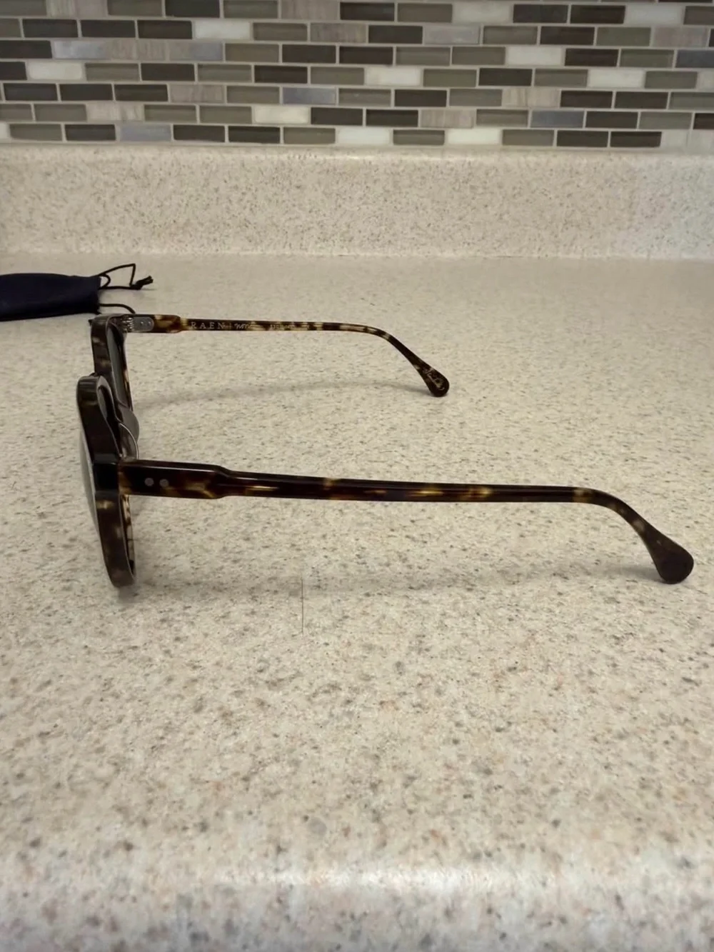 RAEN Tortoiseshell Round Sunglasses with Dark Lenses